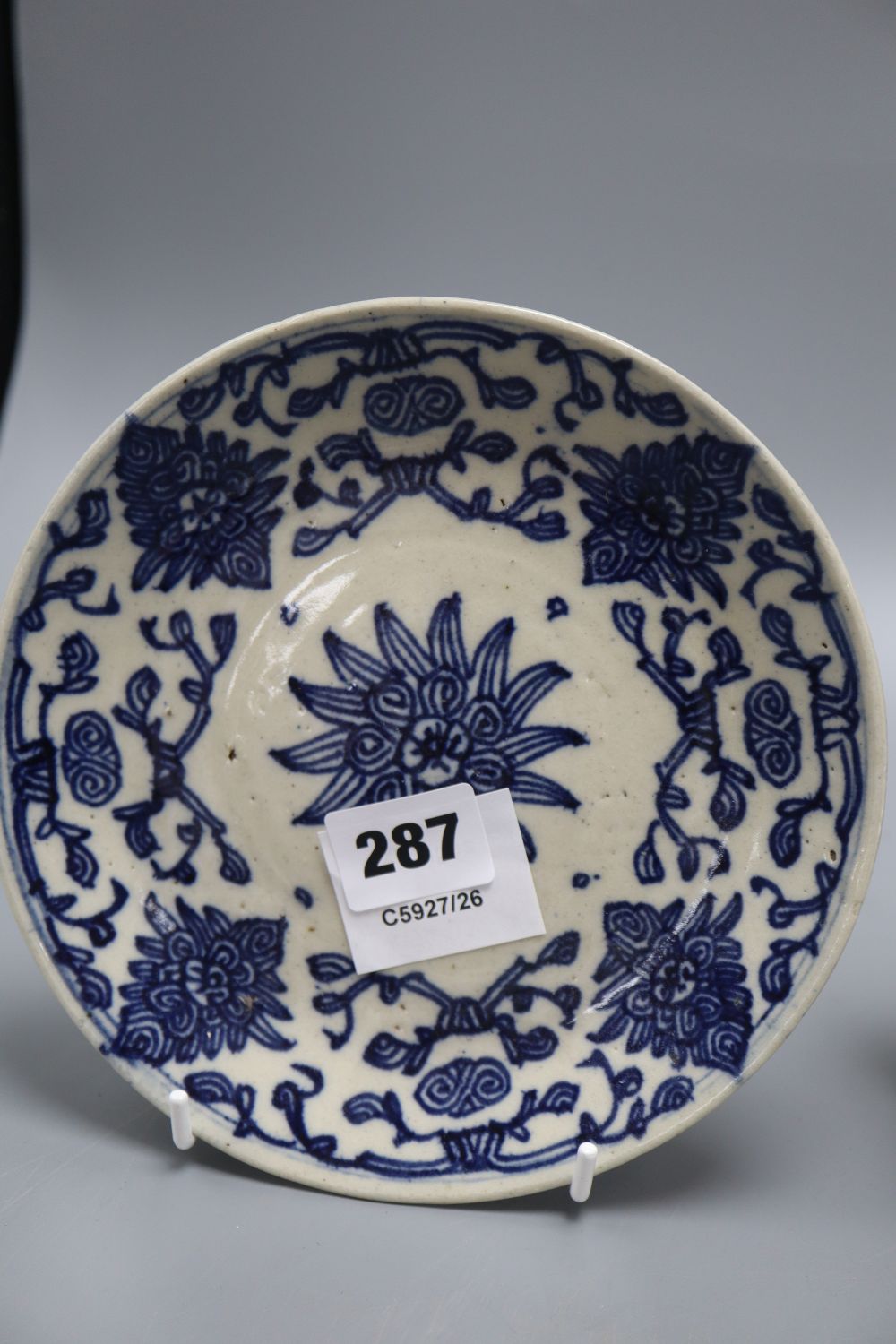 A Chinese blue and white dish, a wall pocket and a bird group, tallest 26cm